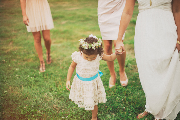 Cute little girl at wedding in lace dress and flower crown - Photo by Ryan Flynn Photography